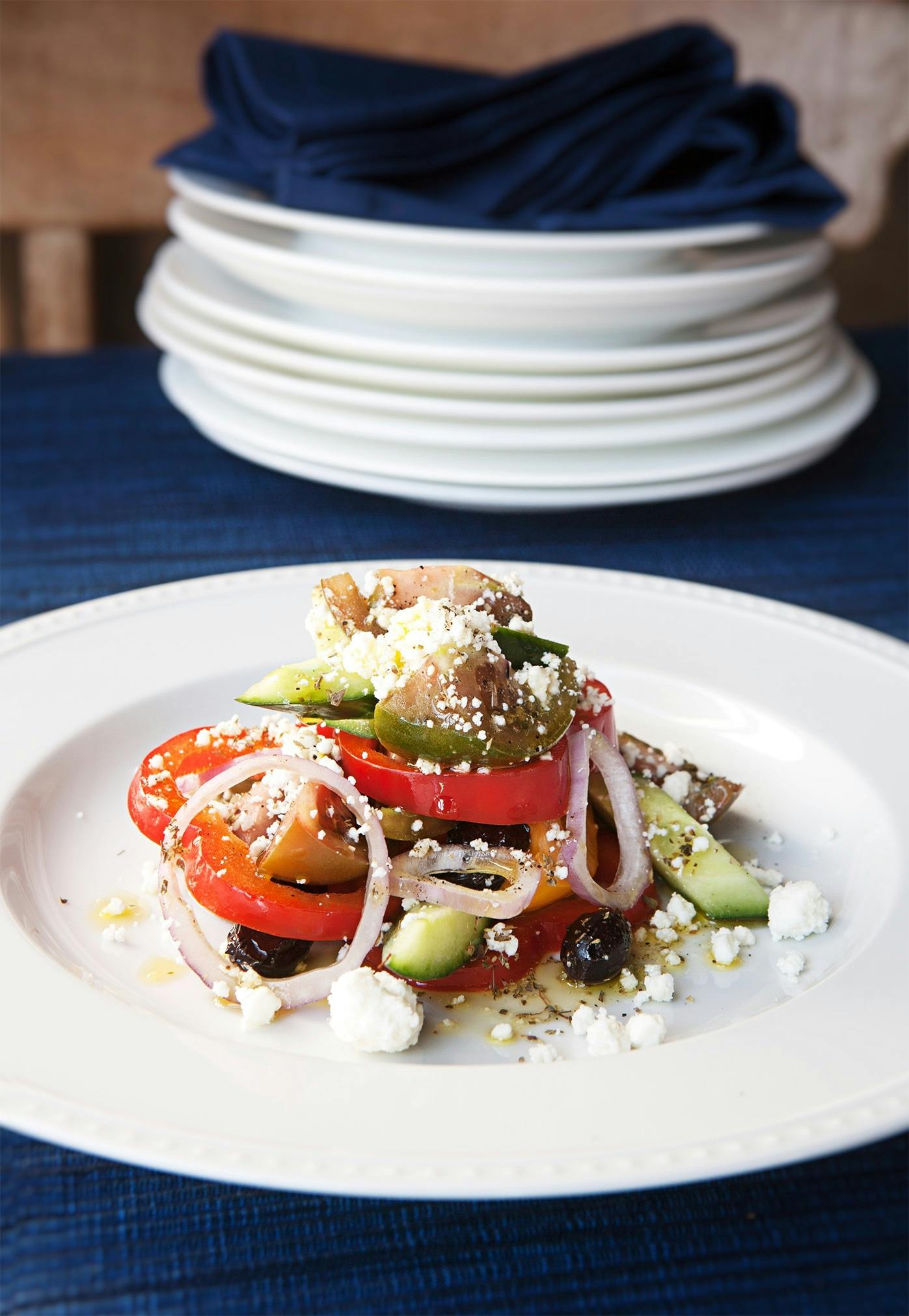 a white plate topped with different types of food on a table